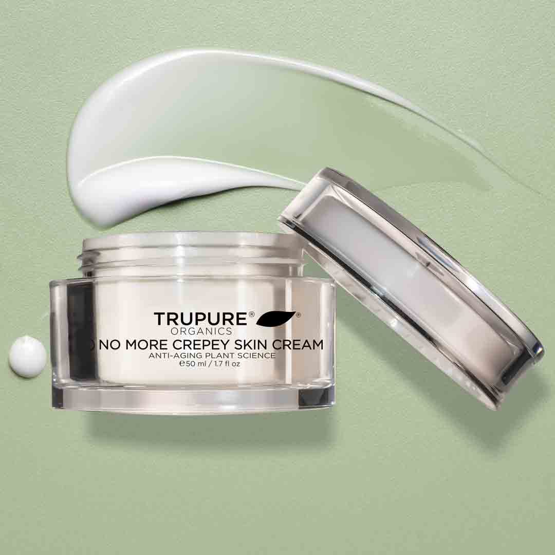 No More Crepey Skin Cream jar on a sage green background